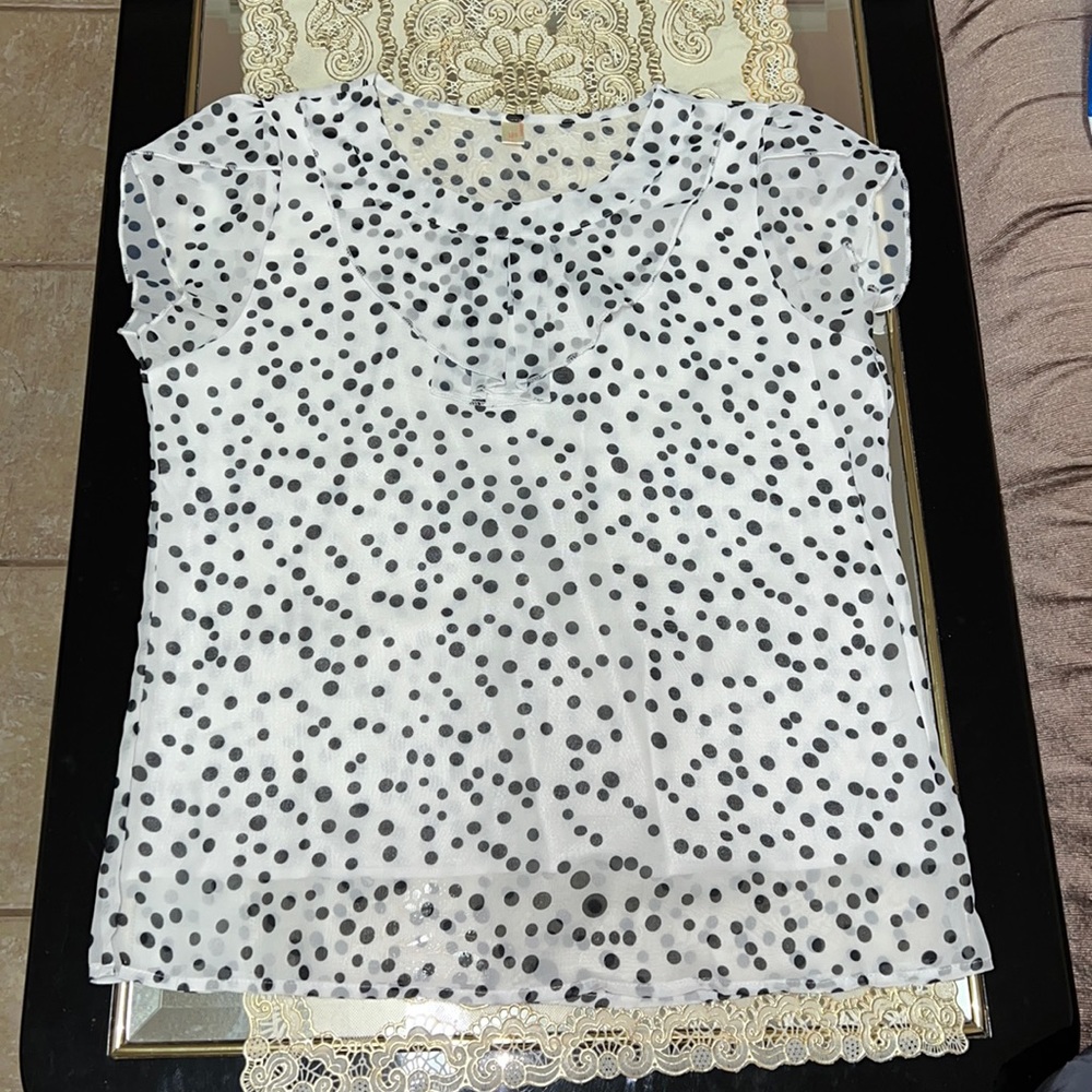 White short-sleeved blouse with black dots
